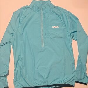 Hoka Light Blue rain jacket